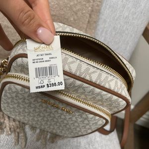 MICHAEL KORS
Jet Set Travel Medium Logo Crossbody Bag $398